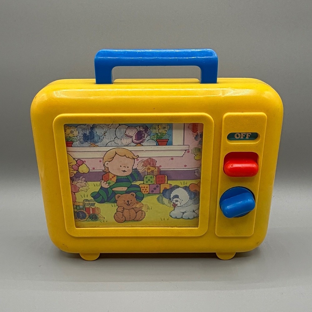 Vintage 1990 Shelcore Musical Toy TV Wind Up Scrolling Screen Yellow Blue Red